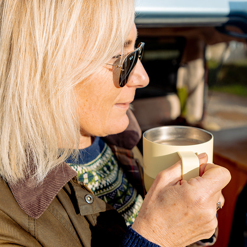 12oz-rise-mug-r3 12oz_rise_coffee_mug_wax_yellow_woman_drink_closeup_square.jpg
