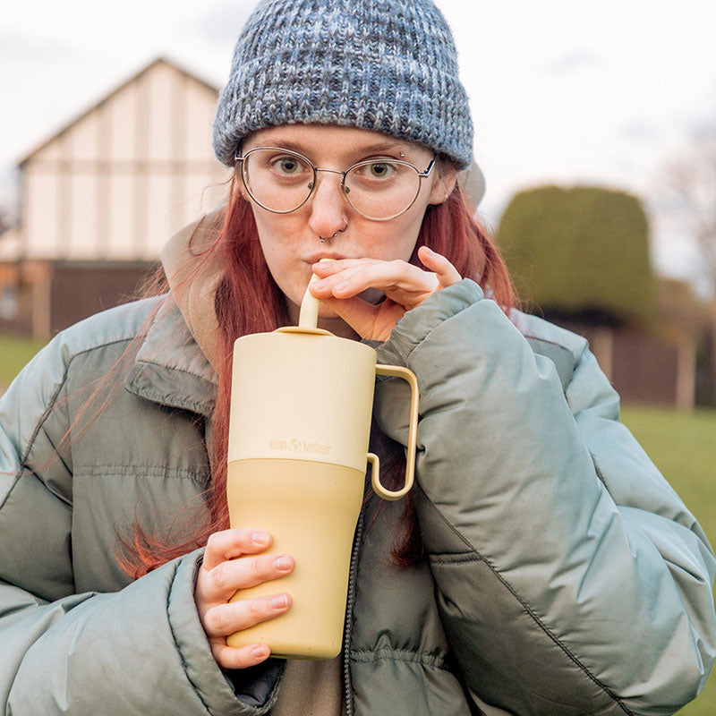 26oz-rise-tumbler-with-straw-lid-u3 26oz_rise_rumbler_straw_wax_yellow_woman_sip_square.jpg