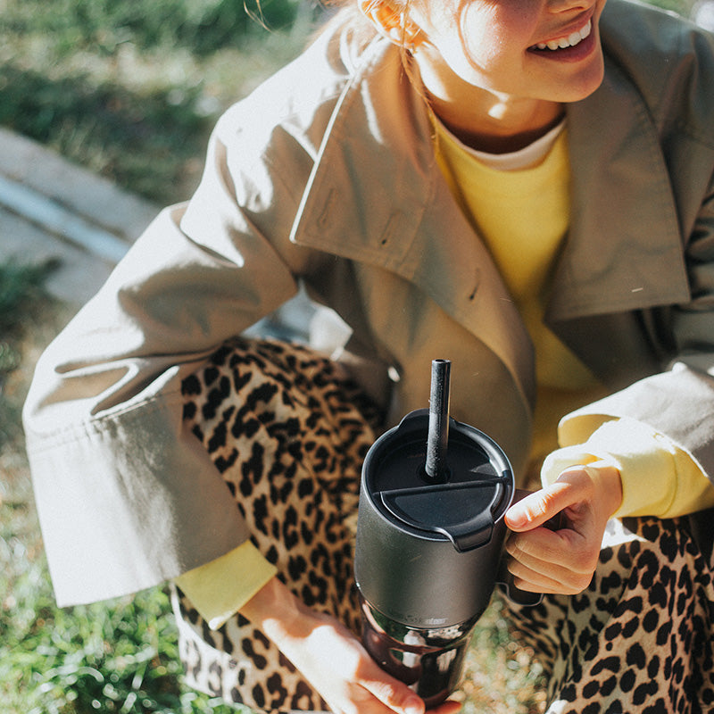 26oz-rise-tumbler-with-straw-lid-u3 26oz_rise_tumbler_black_woman_topview_square.jpg