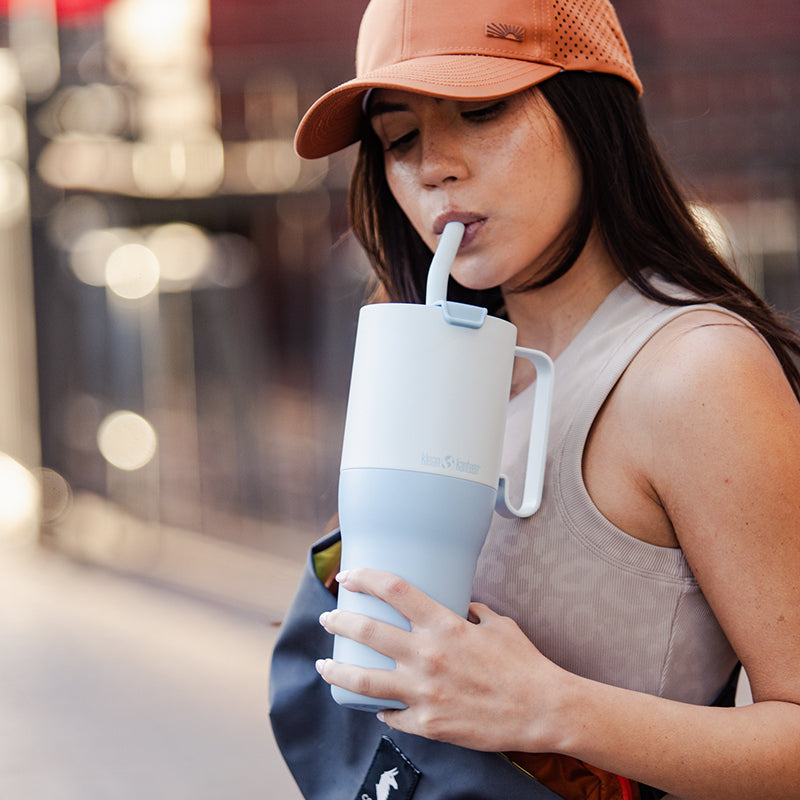 36oz-rise-tumbler-with-straw-lid-s7 36oz_rise_tumbler_straw_girl_sip_square.jpg