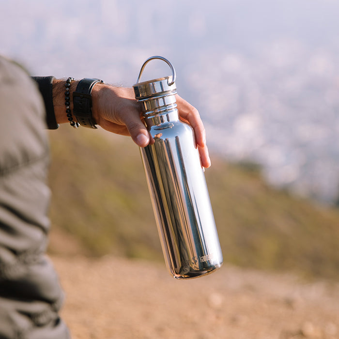 27oz-reflect-with-bamboo-cap-o3 K27SSLRF-MS-BAMBOO_reflect_bottle_hand_lifestyle.jpg