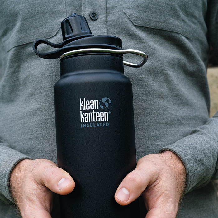 tkwide-chug-cap-i7 K32TKWSSL-SB-Craddled-Bottle_closeup_lifestyle.jpg