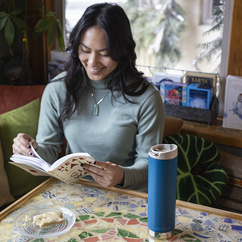 20oz-tkwide-with-cafe-cap-e7 tkwide_20oz_insulated_tumbler_cafe_woman_reading_square.jpg