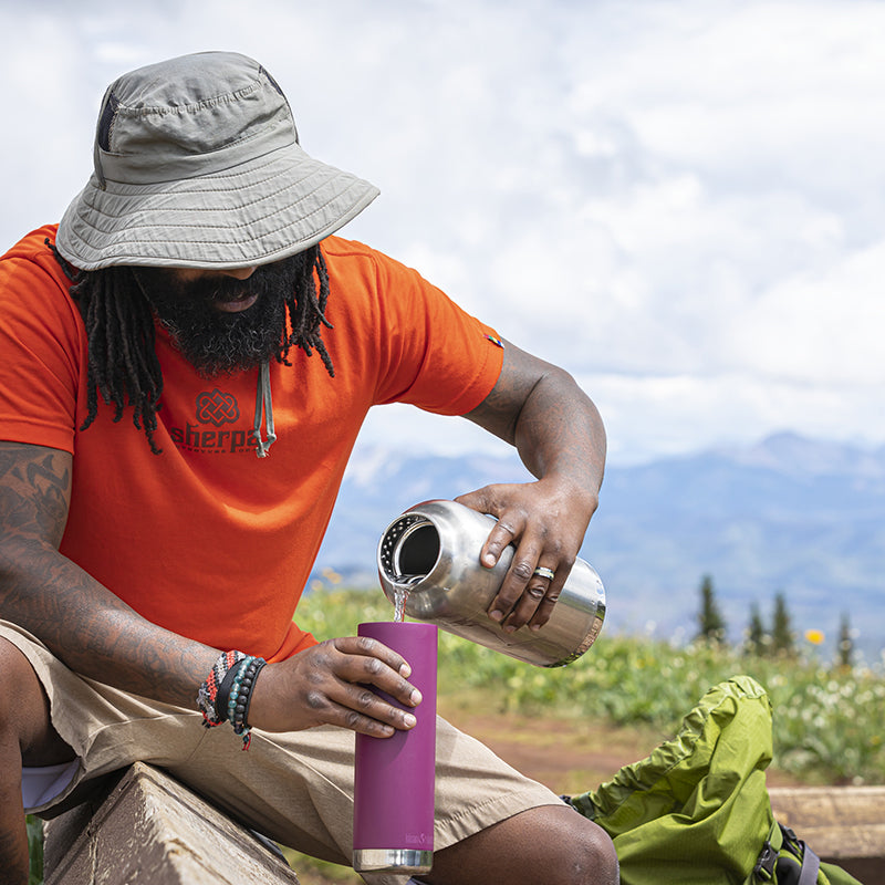 64oz-tkwide-with-loop-cap-b7 tkwide_64oz_bottle_backpacker_mountains_filling_square.jpg