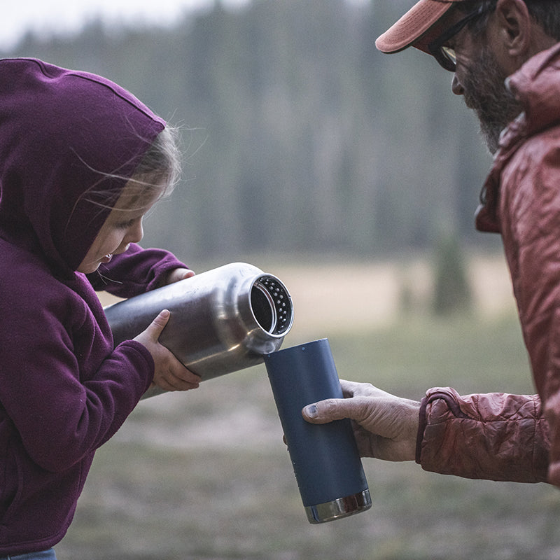 64oz-tkwide-with-loop-cap-b7 tkwide_64oz_bottle_girl_dad_filling_square.jpg